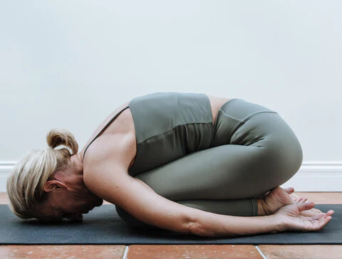 woman doing yoga