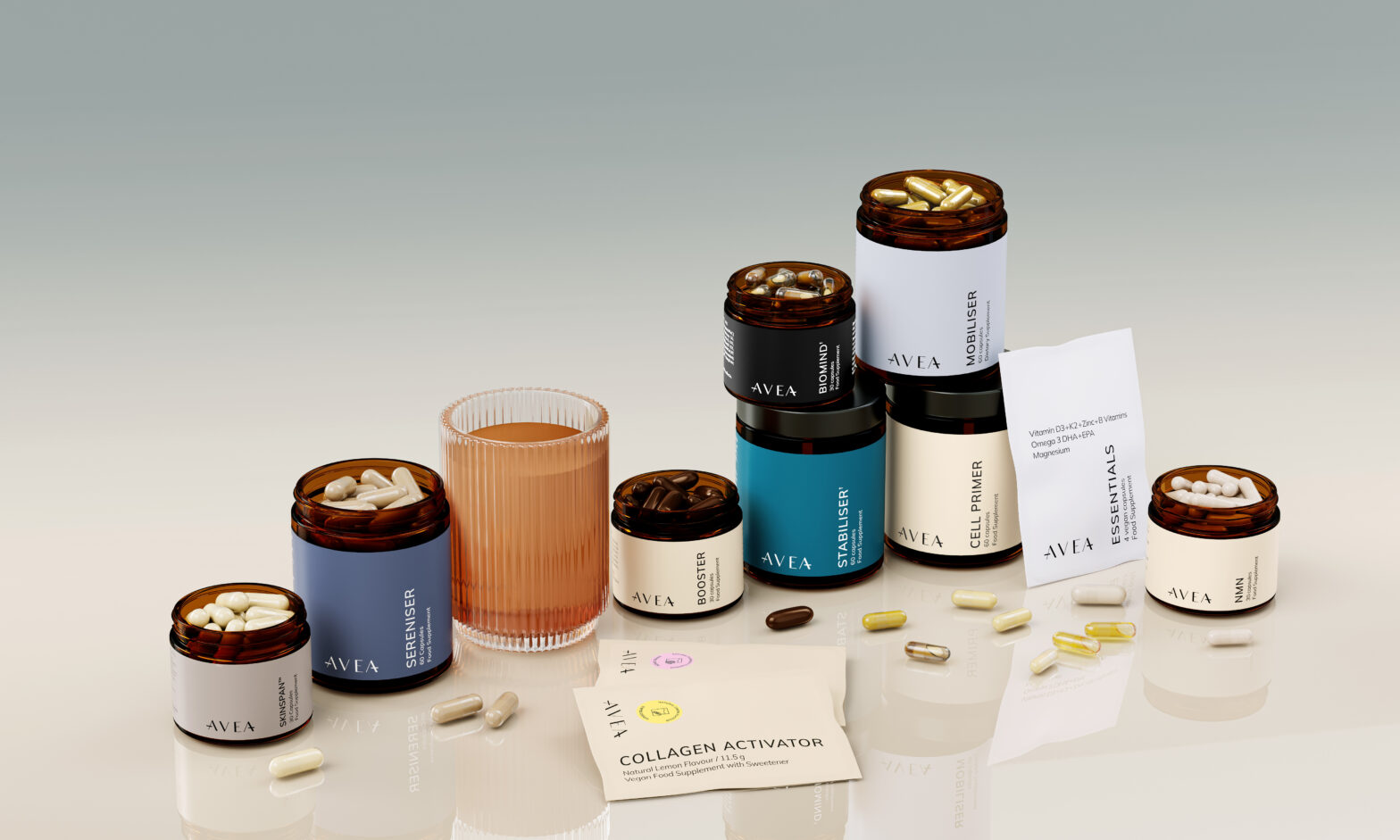AVEA supplement products arranged on a reflective surface beside a glass of drink, including Sereniser, Stabiliser, Booster, Biomind, Mobiliser, Cell Primer, NMN, Skinspan and Collagen Activator sachets.